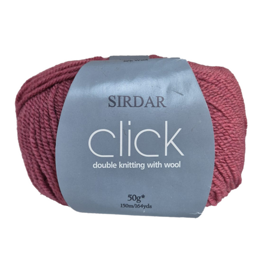 Ball of Sirdar Click yarn with a gray label on a white background